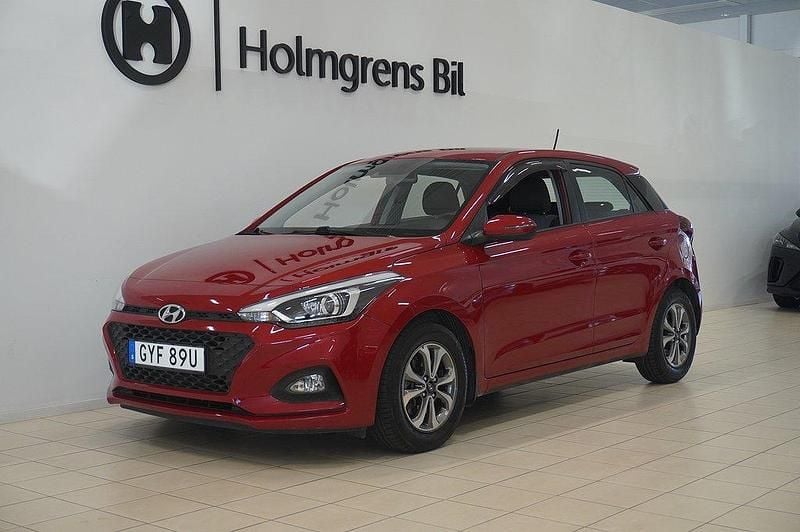 Röd (passion red) Begagnad 2019 Hyundai i20 Halvkombi | 159 000 kr (Marknadspris) - Bild 1/4