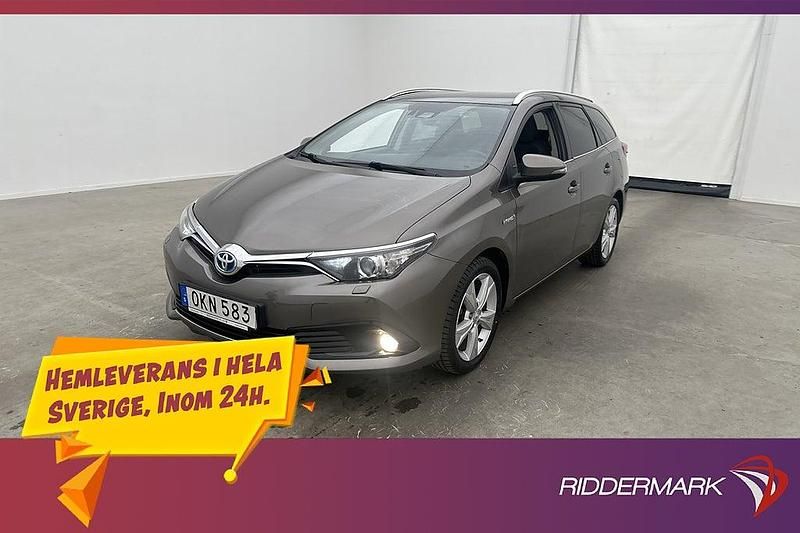 Mörkgrå Begagnad 2016 Toyota Auris Hybrid Kombi | 149 800 kr (Marknadspris) - Bild 1/3