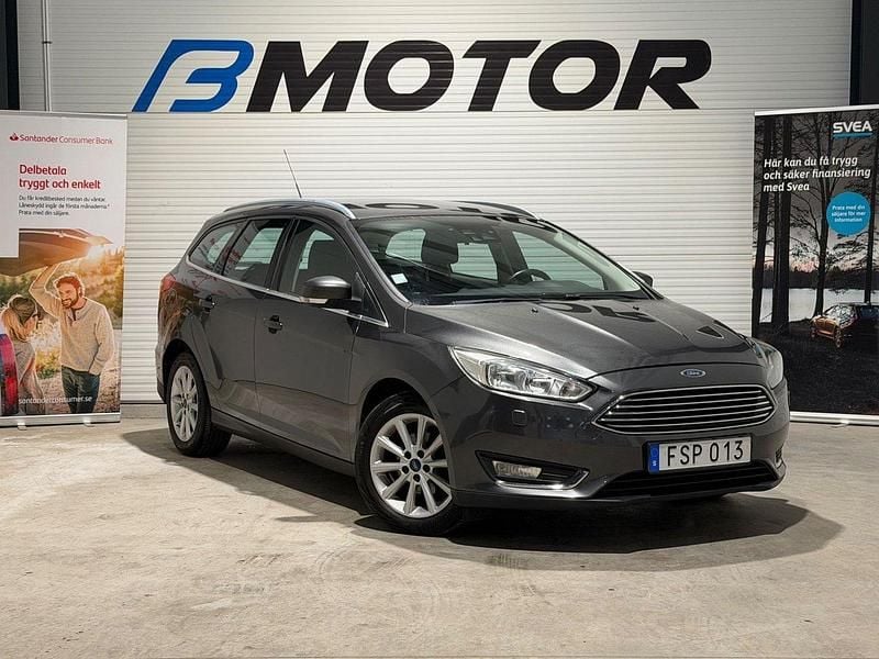Grå Begagnad 2015 Ford Focus Titanium Kombi | 79 900 kr (Marknadspris) - Bild 1/4