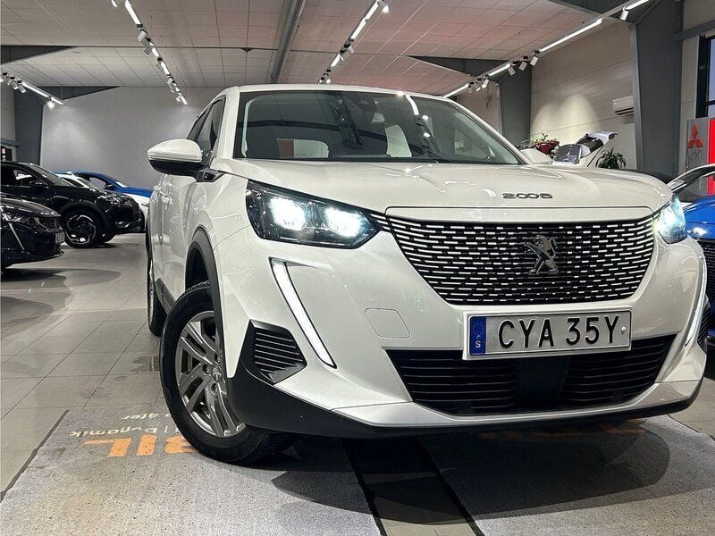 Vit Begagnad 2021 Peugeot e-2008 Active SUV | 189 900 kr (Marknadspris) - Bild 1/4