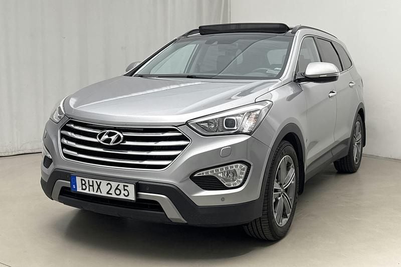 Silver Begagnad 2014 Hyundai Grand Santa Fe Premium SUV | 154 800 kr - Bild 1/4