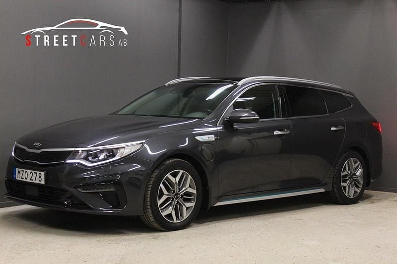 Grå Begagnad 2020 Kia Optima Hybrid 2 Sedan | 269 900 kr (Marknadspris) - Bild 1/4