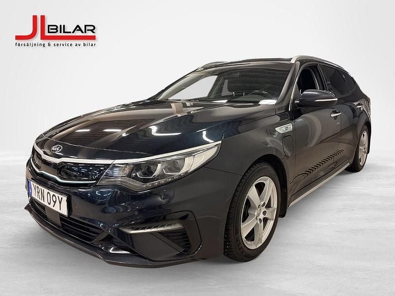 Blå Begagnad 2020 Kia Optima Hybrid Sport Sedan | 189 900 kr (Marknadspris) - Bild 1/4