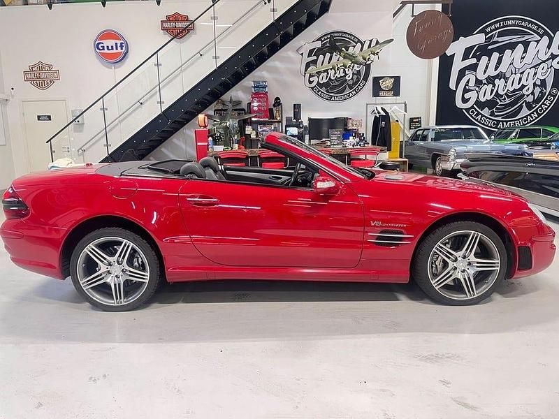 Röd (fire opal red) Begagnad 2006 Mercedes SL55 AMG AMG Cab | 439 000 kr - Bild 1/4
