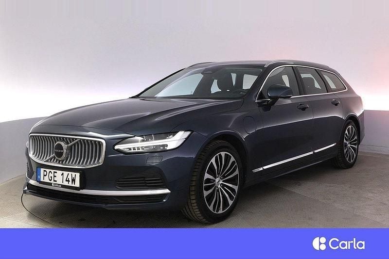 Mörkblå Begagnad 2023 Volvo V90 Core Kombi | 385 900 kr (Marknadspris) - Bild 1/4
