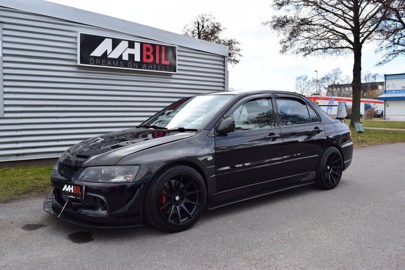 Svart Begagnad 2004 Mitsubishi Lancer Sedan | 329 900 kr - Bild 1/4