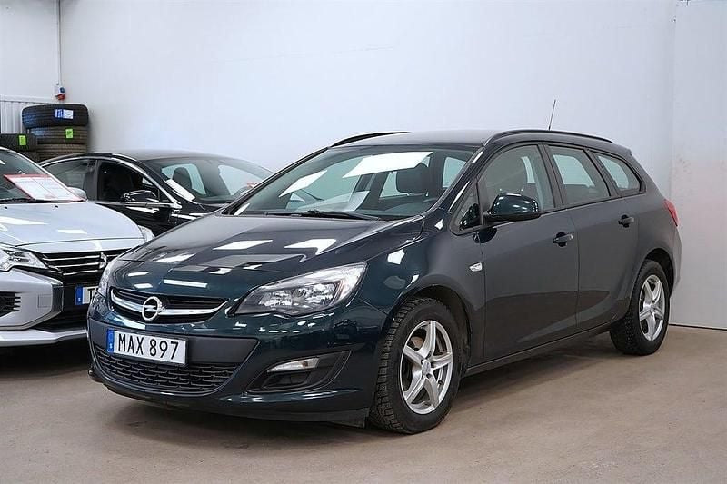 Begagnad Opel Astra Enjoy 140 HK (102 kW) 2015 Grönmetallic Kombi