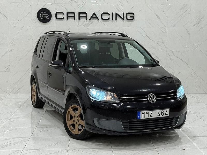 Svart Begagnad 2011 VW Touran Minibuss | 44 900 kr (Superpris) - Bild 1/4