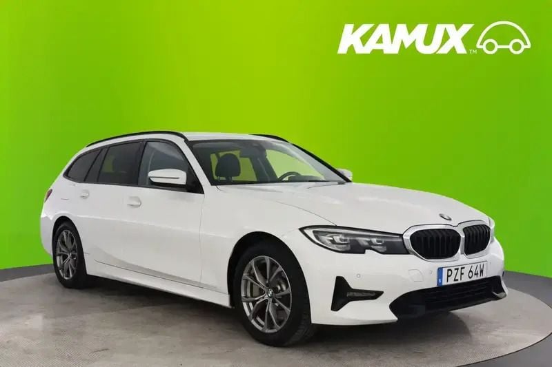 Vit Begagnad 2020 BMW 330e iPerformance Kombi | 238 700 kr (Marknadspris) - Bild 1/4