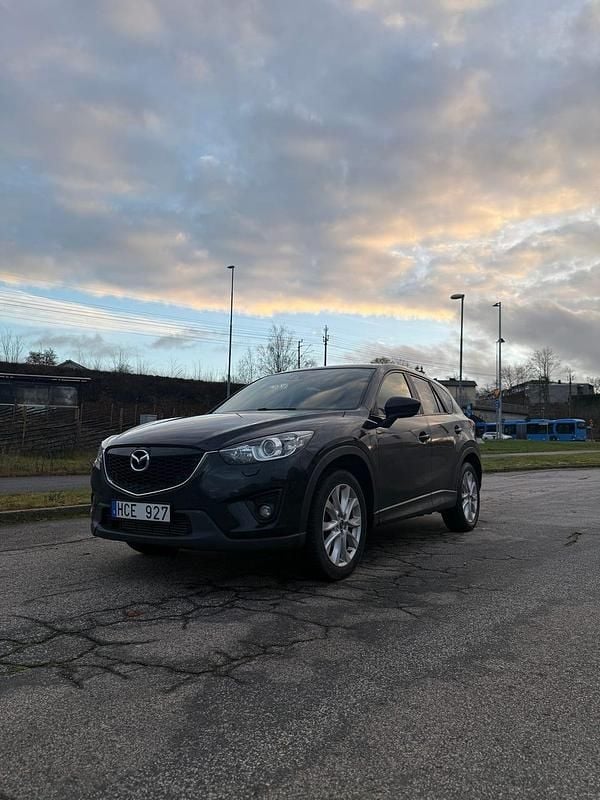 Svart Begagnad 2012 Mazda CX-5 SUV | 79 500 kr (Marknadspris) - Bild 1/4
