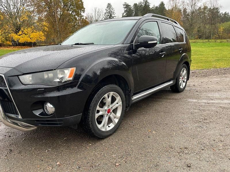 Svart Begagnad 2012 Mitsubishi Outlander Comfort Edition SUV | 64 900 kr (Marknadspris) - Bild 1/4
