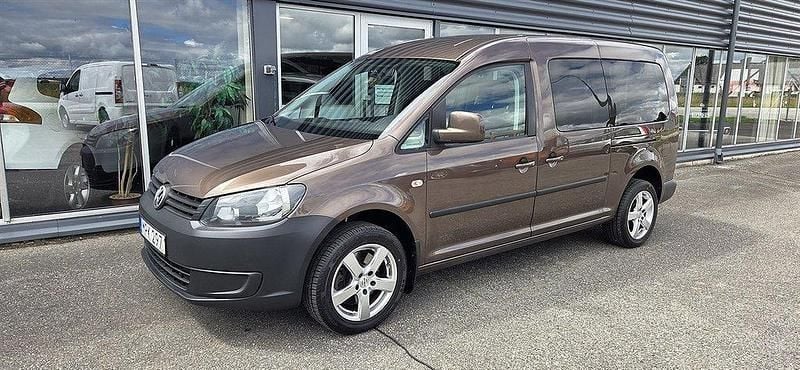 Ljusbrun (brun metallic) Begagnad 2014 VW Caddy Maxi Life Life Minibuss | 149 900 kr (Marknadspris) - Bild 1/4