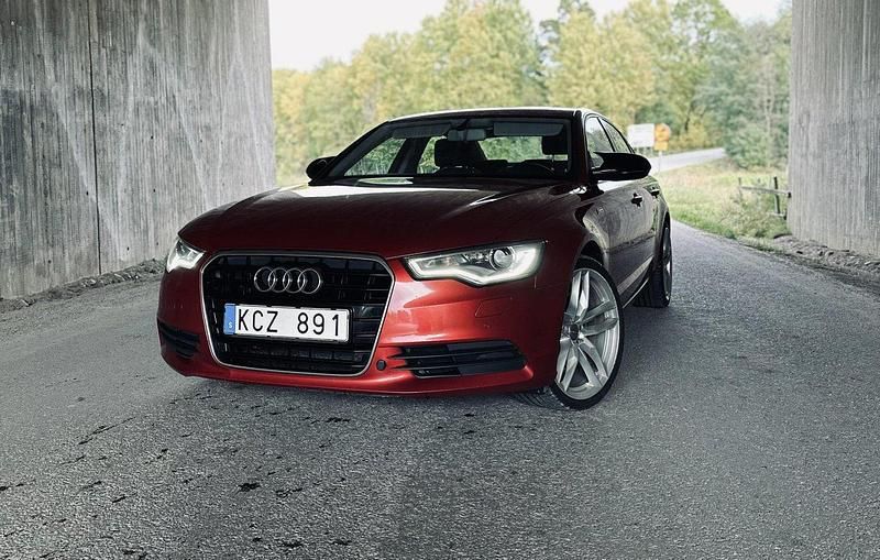 Röd Begagnad 2012 Audi A6 Comfort Sedan | 149 000 kr - Bild 1/4