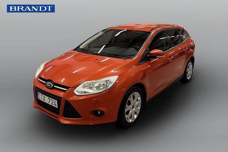 Orange Begagnad 2011 Ford Focus Kombi | 44 900 kr (Marknadspris) - Bild 1/4