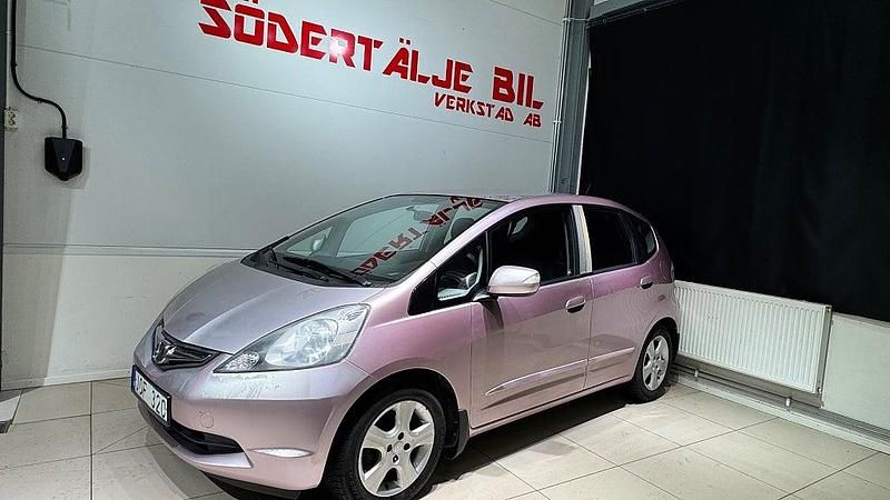 Begagnad Honda Jazz 99 HK (72 kW) 2009 Röd Halvkombi