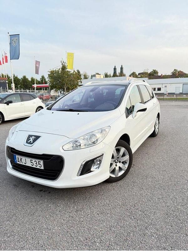 Vit Begagnad 2013 Peugeot 308 Kombi | 57 000 kr (Marknadspris) - Bild 1/4