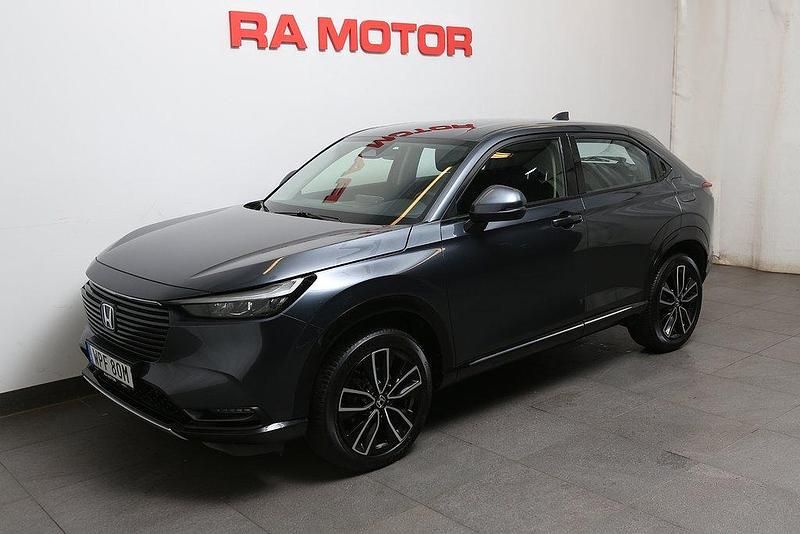 Mörkgrå Begagnad 2021 Honda HR-V Advance SUV | 279 800 kr (Marknadspris) - Bild 1/3