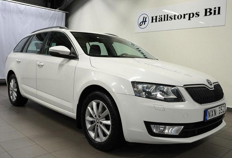 Vit Begagnad 2014 Skoda Octavia Ambition Kombi | 89 900 kr (Marknadspris) - Bild 1/4