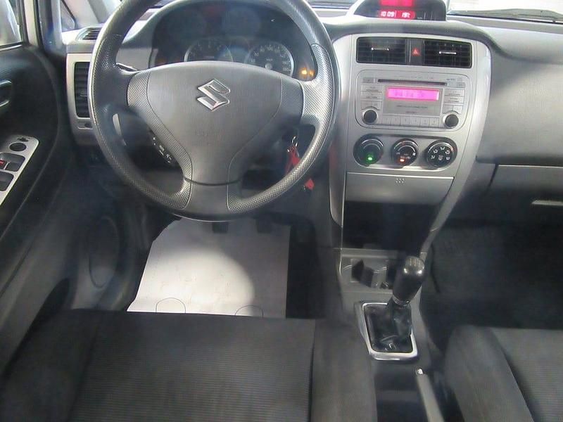 Begagnad Suzuki Liana 106 HK (77 kW) 2004 Brun Sedan