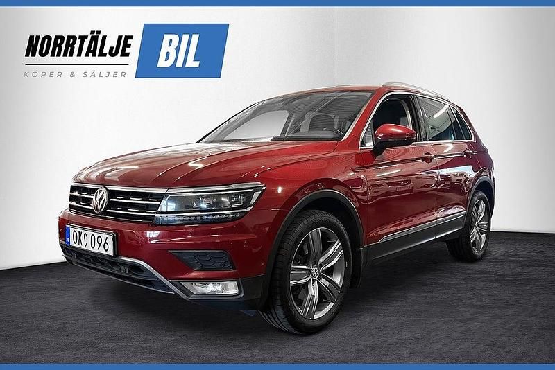 Mörkröd (röd) Begagnad 2016 VW Tiguan GT SUV | 154 900 kr (Marknadspris) - Bild 1/4