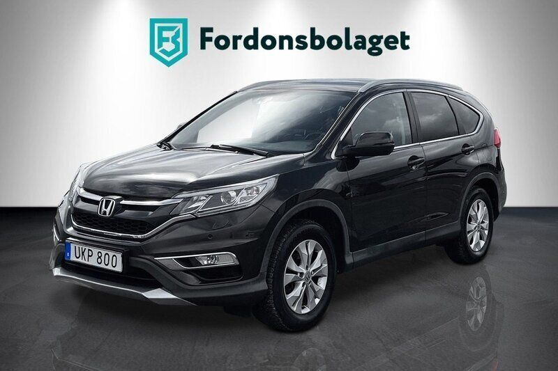 Mörkbrun (brun) Begagnad 2015 Honda CR-V Executive SUV | 169 900 kr (Marknadspris) - Bild 1/4