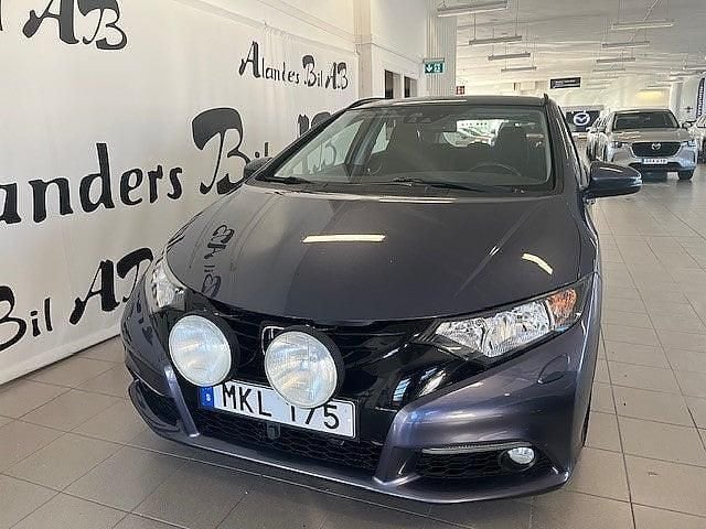 Begagnad Honda Civic Elegance 120 HK (88 kW) 2014 Blå Kombi