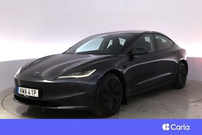 Grå Begagnad 2023 Tesla Model 3 Long Range Sedan | 482 900 kr - Bild 1/4