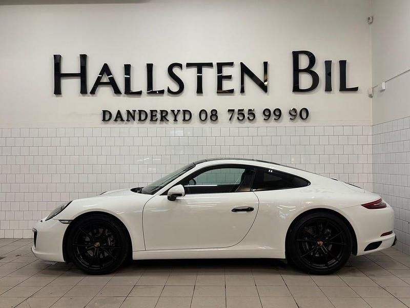 Vit Begagnad 2019 Porsche 911 Carrera Sport Sportkupé | 799 000 kr - Bild 1/4