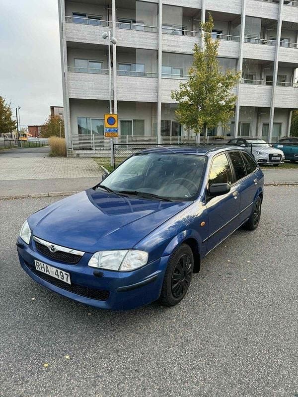 Blå Begagnad 2000 Mazda 3 Halvkombi | 18 900 kr - Bild 1/4