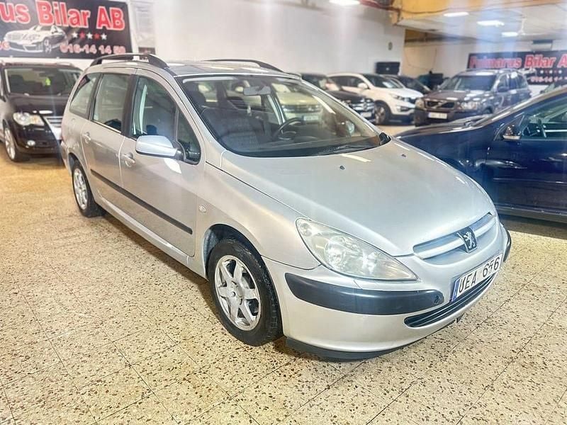 Ljusgrå Begagnad 2003 Peugeot 307 Kombi | 19 900 kr (Marknadspris) - Bild 1/4