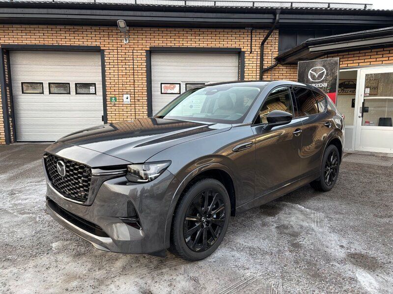 Grå (machine grey metallic) Ny 2024 Mazda CX-60 Homura-Line SUV | 587 600 kr (Marknadspris) - Bild 1/3