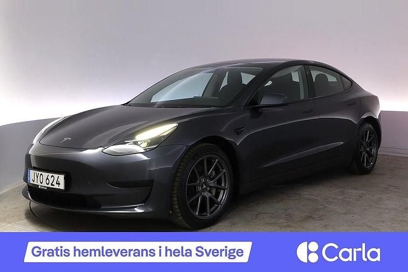 Grå Begagnad 2022 Tesla Model 3 Standard Range Sedan | 267 990 kr (Bra pris) - Bild 1/4