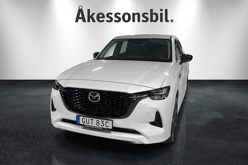 Pearl white metallic Begagnad 2024 Mazda CX-60 Homura-Line SUV | 609 900 kr (Lite dyr) - Bild 1/4