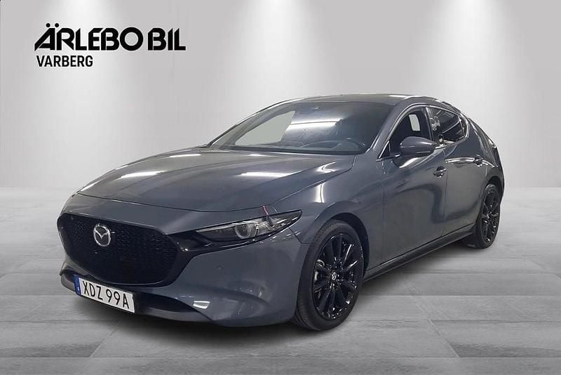 Grå Begagnad 2019 Mazda 3 Homura-Line Halvkombi | 239 000 kr (Marknadspris) - Bild 1/4