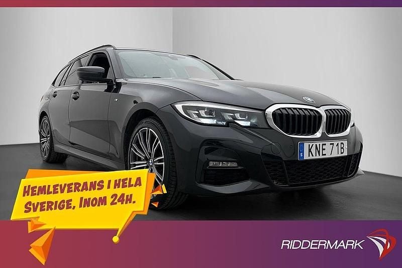Svart Begagnad 2021 BMW 330e M Sport Kombi | 319 900 kr (Marknadspris) - Bild 1/3