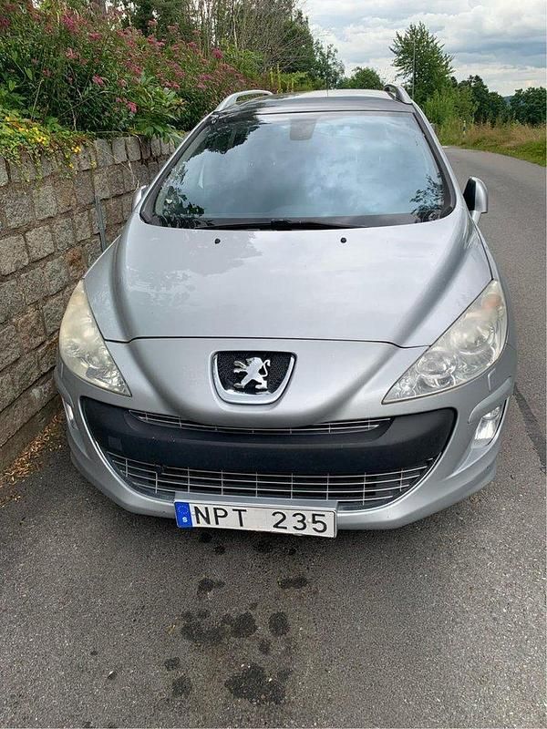 Grå Begagnad 2009 Peugeot 308 Kombi | 28 000 kr (Marknadspris) - Bild 1/4