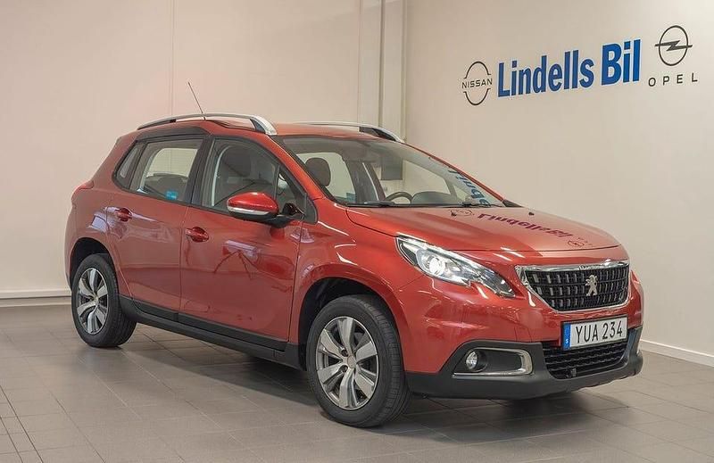 Mörkröd Begagnad 2017 Peugeot 2008 SUV | 119 000 kr (Marknadspris) - Bild 1/4