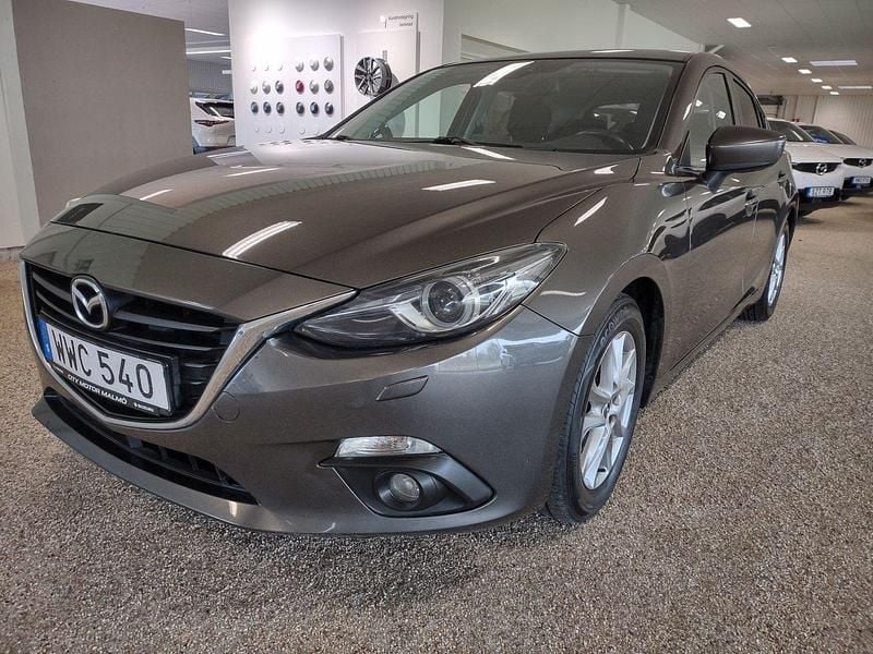 Brun Begagnad 2014 Mazda 3 Vision Halvkombi | 99 500 kr (Marknadspris) - Bild 1/4