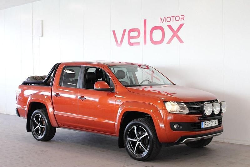 Ljusröd (röd) Begagnad 2014 VW Amarok Canyon Pickup | 169 900 kr (Marknadspris) - Bild 1/4