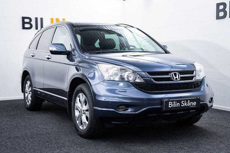 Mörkgrå (grå) Begagnad 2012 Honda CR-V Executive SUV | 129 900 kr (Marknadspris) - Bild 1/4
