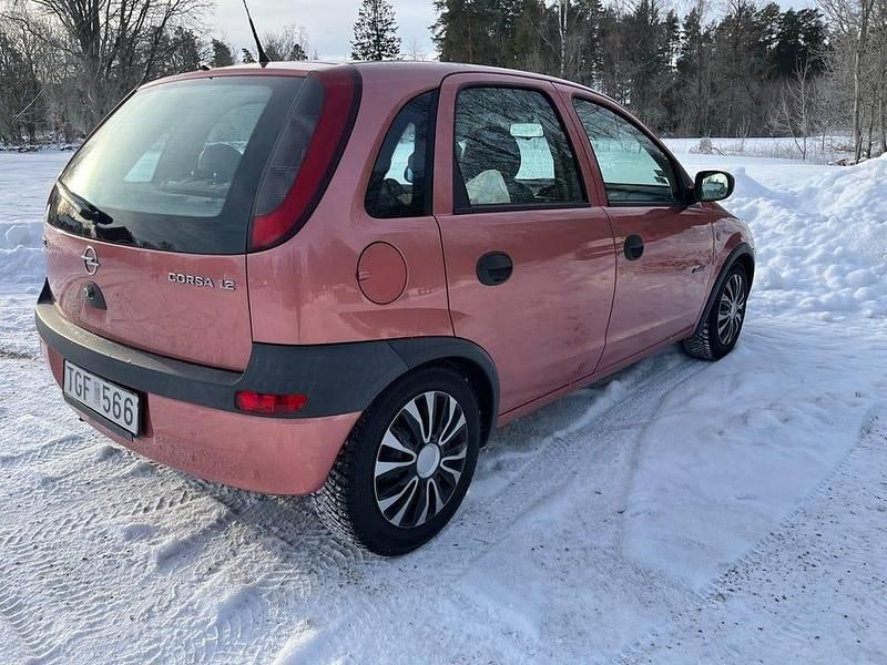 Begagnad Opel Corsa 75 HK (55 kW) 2002 Röd Halvkombi