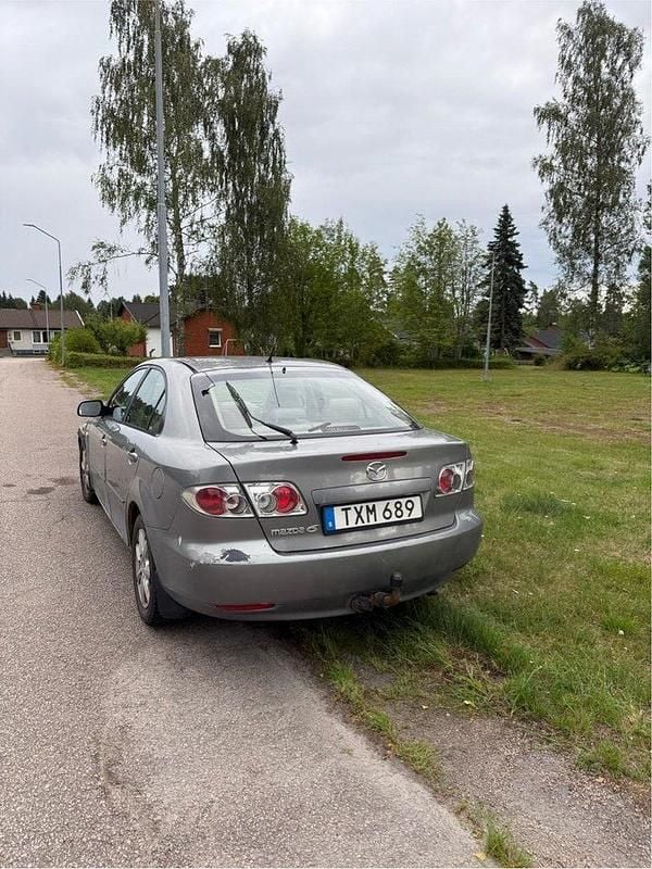 Grå Begagnad 2003 Mazda 6 Inclusive Halvkombi | 14 000 kr (Superpris) - Bild 1/4