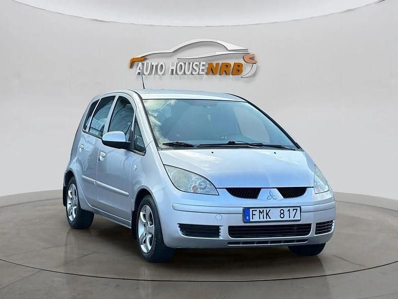 Begagnad Mitsubishi Colt 96 HK (70 kW) 2007 Silver Halvkombi