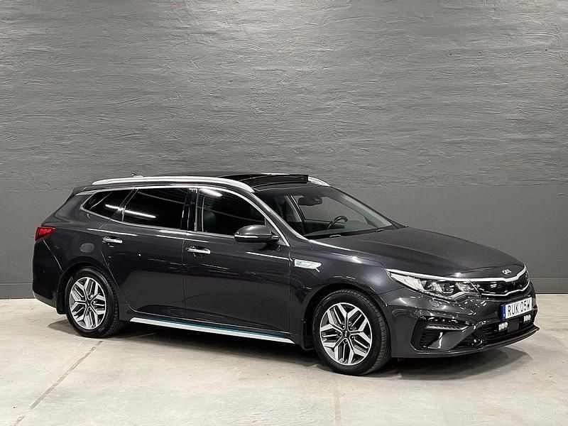 Grå (grå metallic) Begagnad 2019 Kia Optima Hybrid Advance Sedan | 189 900 kr (Marknadspris) - Bild 1/4