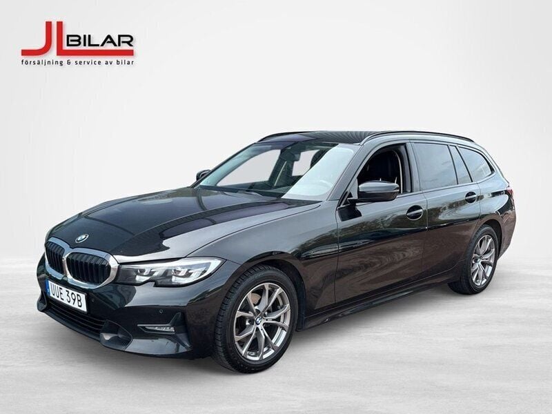 Svart Begagnad 2020 BMW 320 Sport Line Kombi | 264 900 kr (Marknadspris) - Bild 1/4