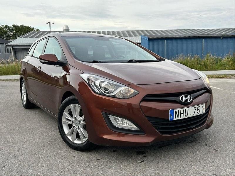 Brun Begagnad 2014 Hyundai i30 Kombi | 59 900 kr (Bra pris) - Bild 1/4