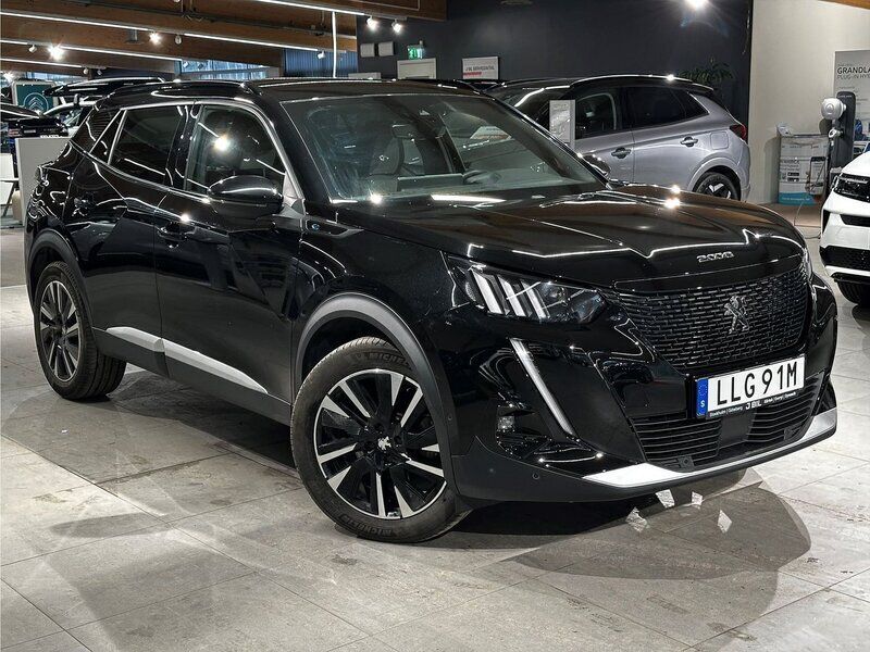 Svart Begagnad 2021 Peugeot e-2008 GT SUV | 209 900 kr (Marknadspris) - Bild 1/4