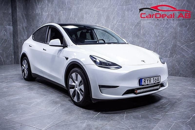 Vit Begagnad 2022 Tesla Model Y Long Range AWD SUV | 279 800 kr (Marknadspris) - Bild 1/4