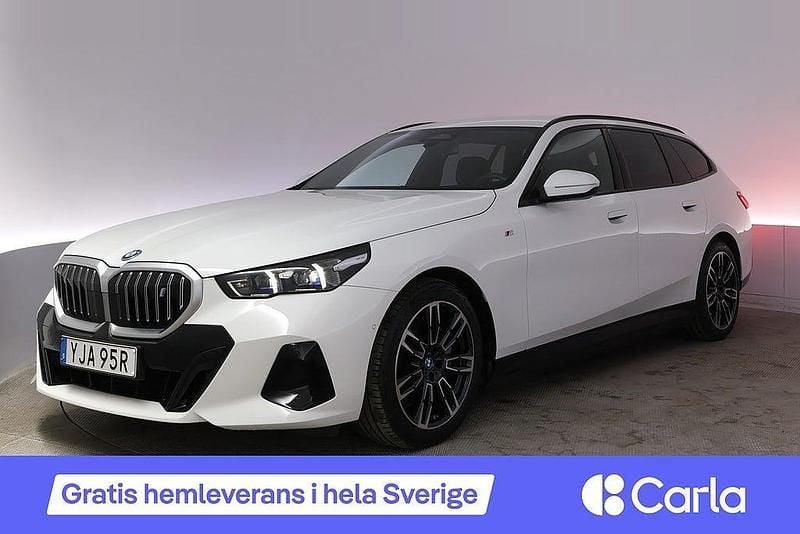 Vit Begagnad 2024 BMW i5 M Sport Kombi | 596 990 kr (Marknadspris) - Bild 1/4