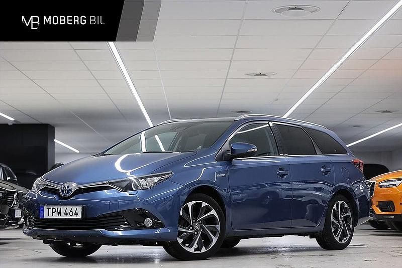 Blå Begagnad 2015 Toyota Auris Hybrid Sport Kombi | 149 900 kr (Marknadspris) - Bild 1/2